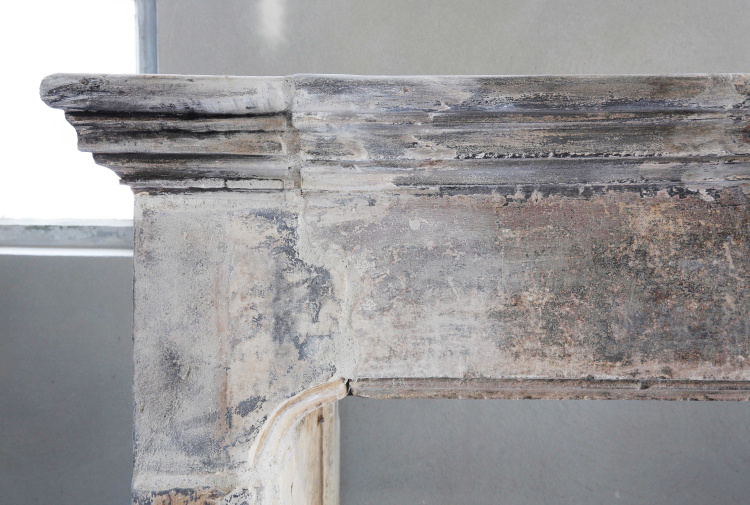 antique fireplace of limestone