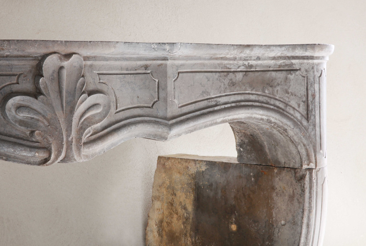 antique fireplace of limestone