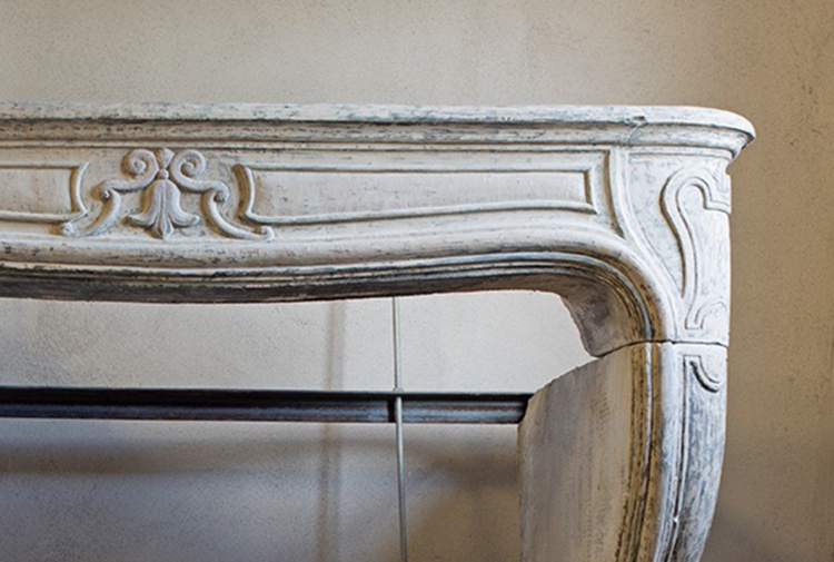 Antique limestone fireplace
