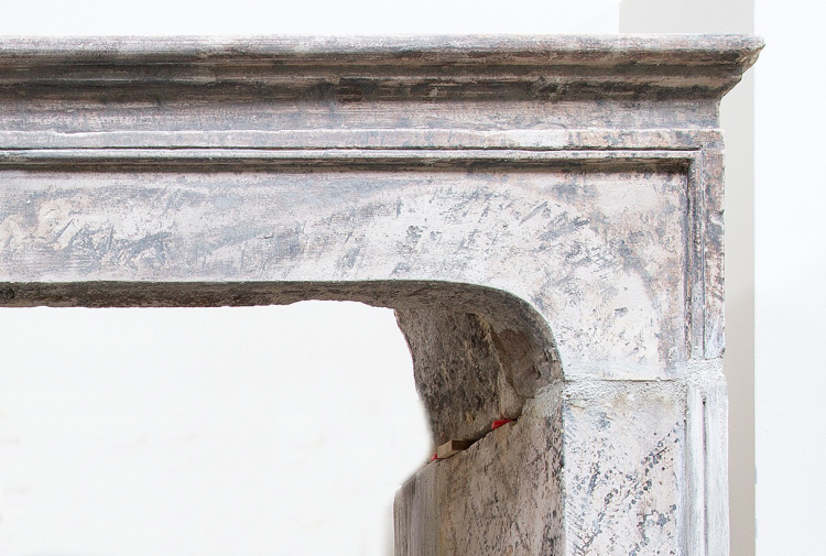 antique limestone fireplace