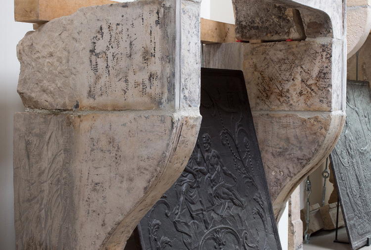 antique limestone fireplace