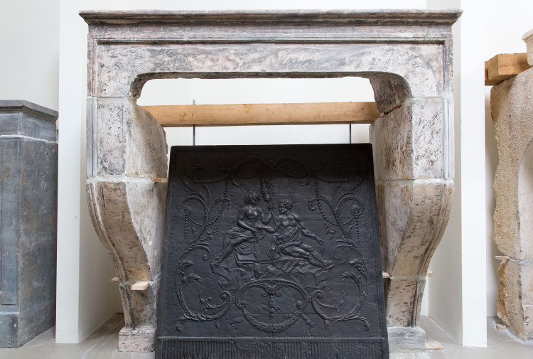 antique limestone fireplace
