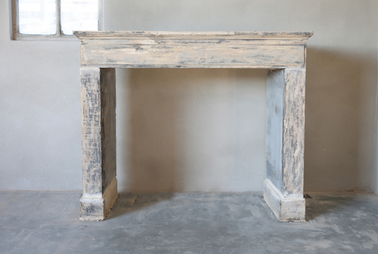 antique fireplace of limestone