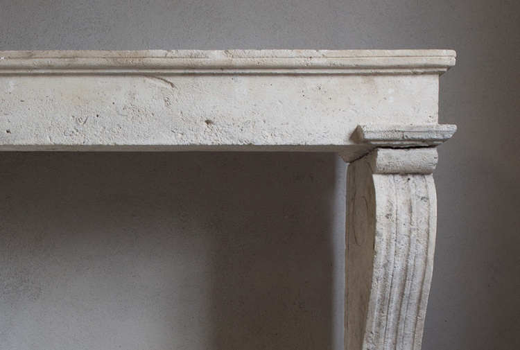 antique fireplace of limestone