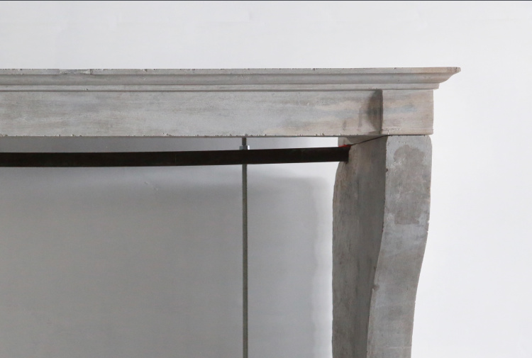 antique fireplace of limestone
