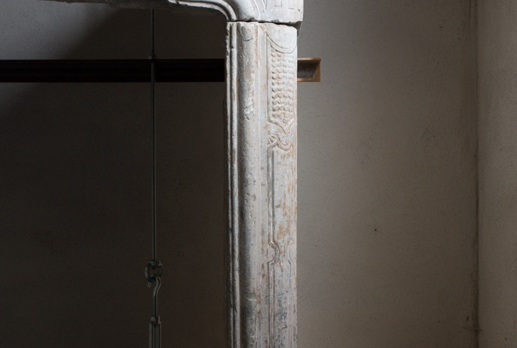 antique limestone fireplace