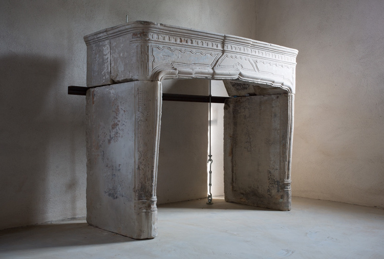 antique limestone fireplace