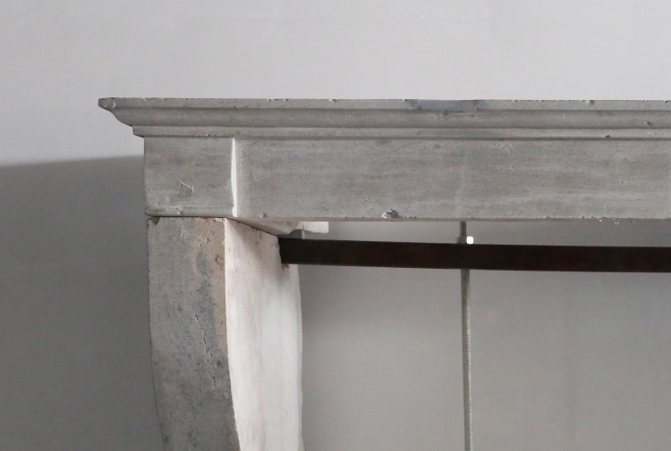 antique fireplace of limestone