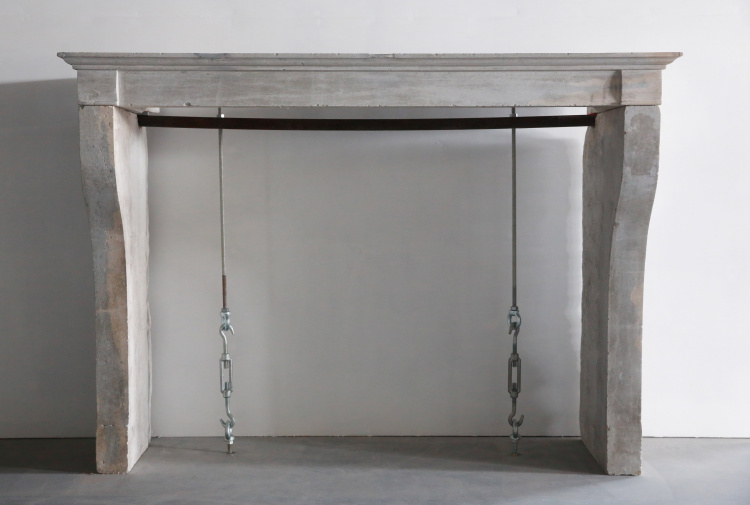 antique fireplace of limestone