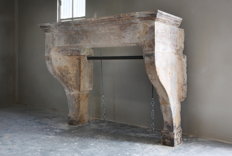 antique fireplace of limestone