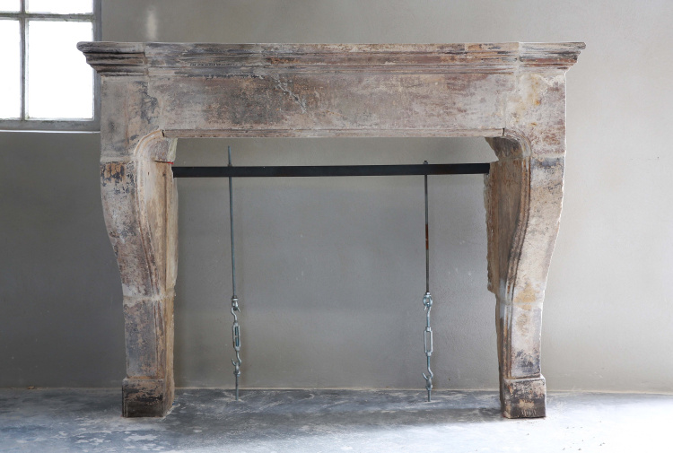 antique fireplace of limestone