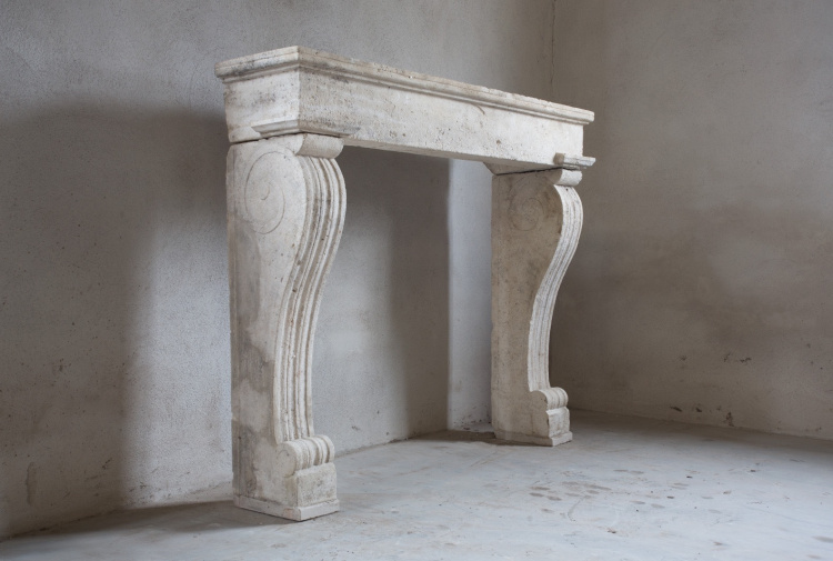 antique fireplace of limestone