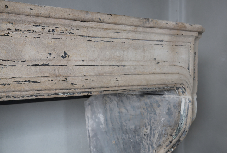 antique fireplace of limestone