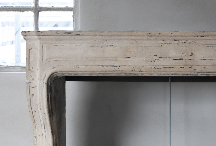 antique fireplace of limestone